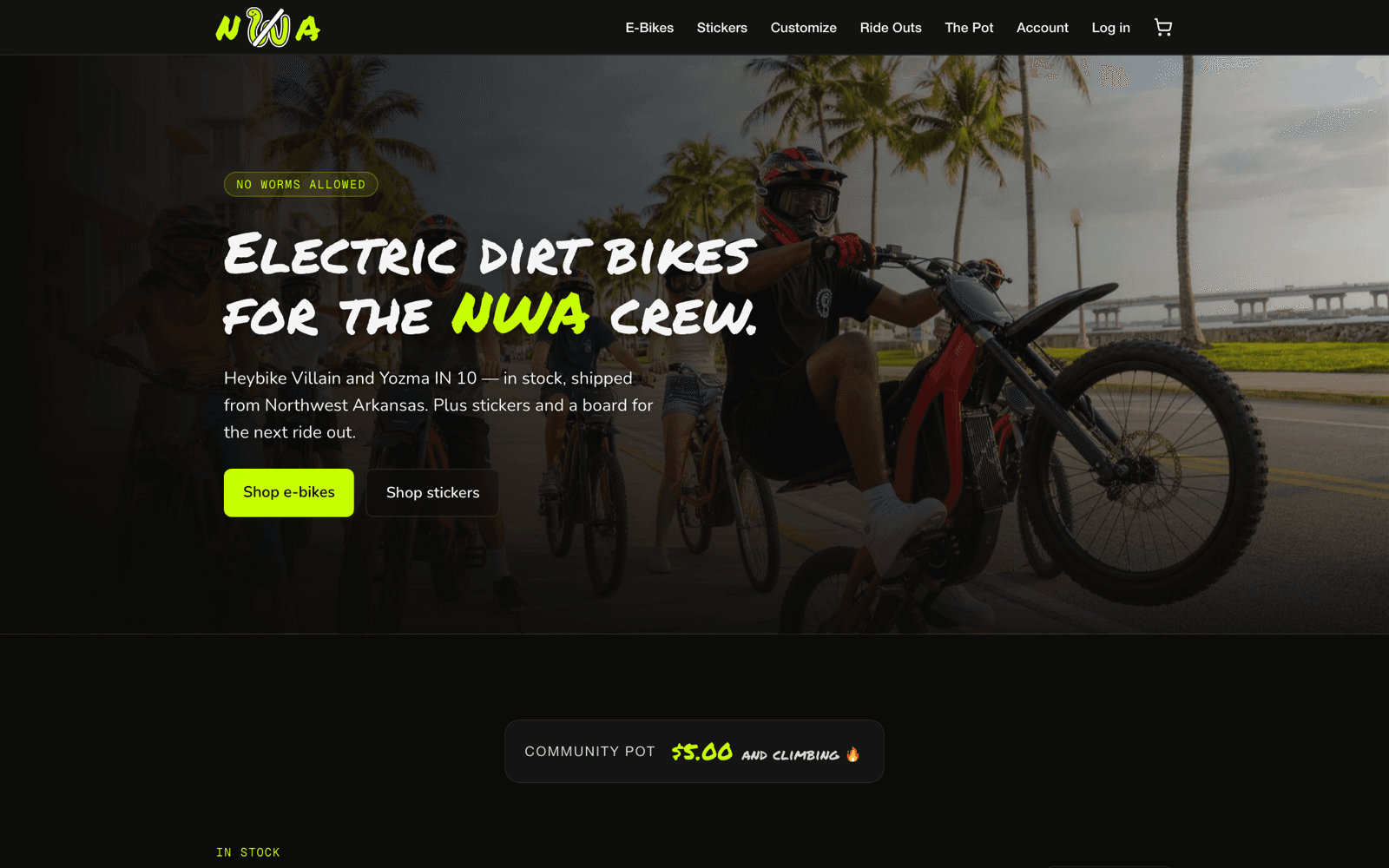 The NWA Bikes home page, showing riders and the electric dirt bike storefront.